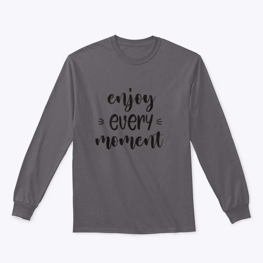 A cozy sweatshirt featuring brush lettering design that reads 'Enjoy Every Moment', made from soft cotton fabric.