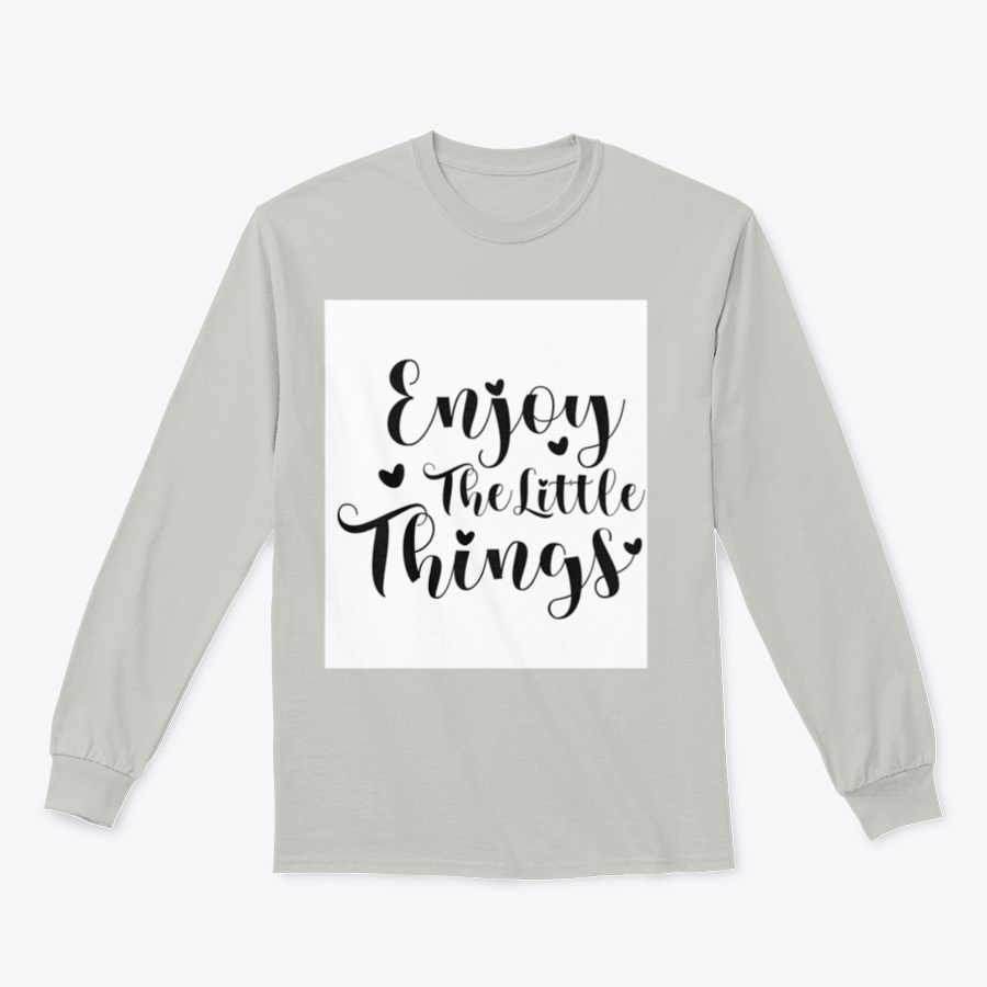 A cozy sweatshirt featuring the calligraphy design 'Enjoy The Little Things', showcasing its soft fabric and classic fit.