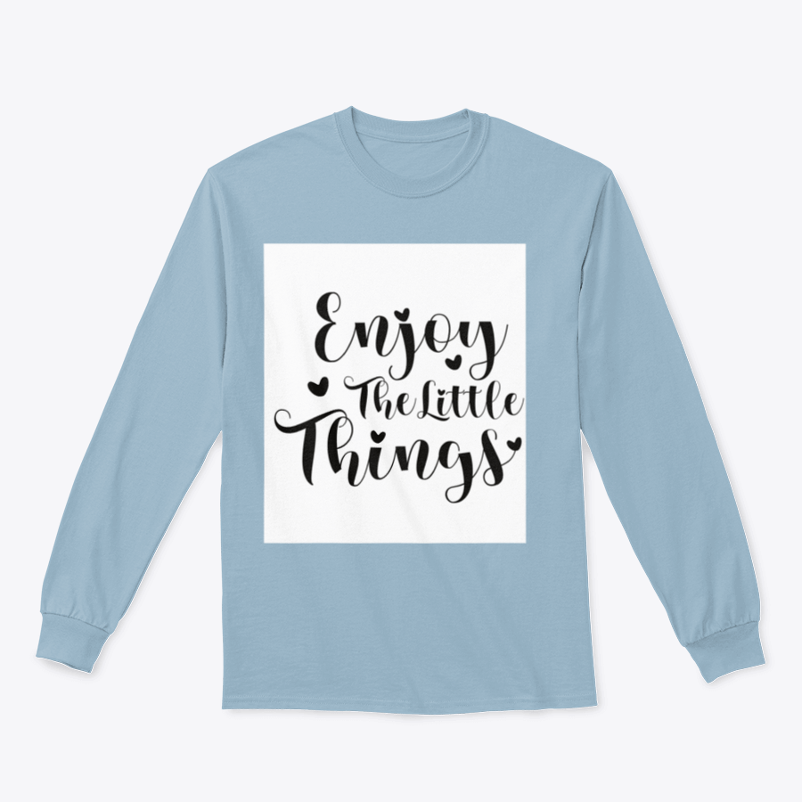 A cozy sweatshirt featuring the calligraphy design 'Enjoy The Little Things', showcasing its soft fabric and classic fit.