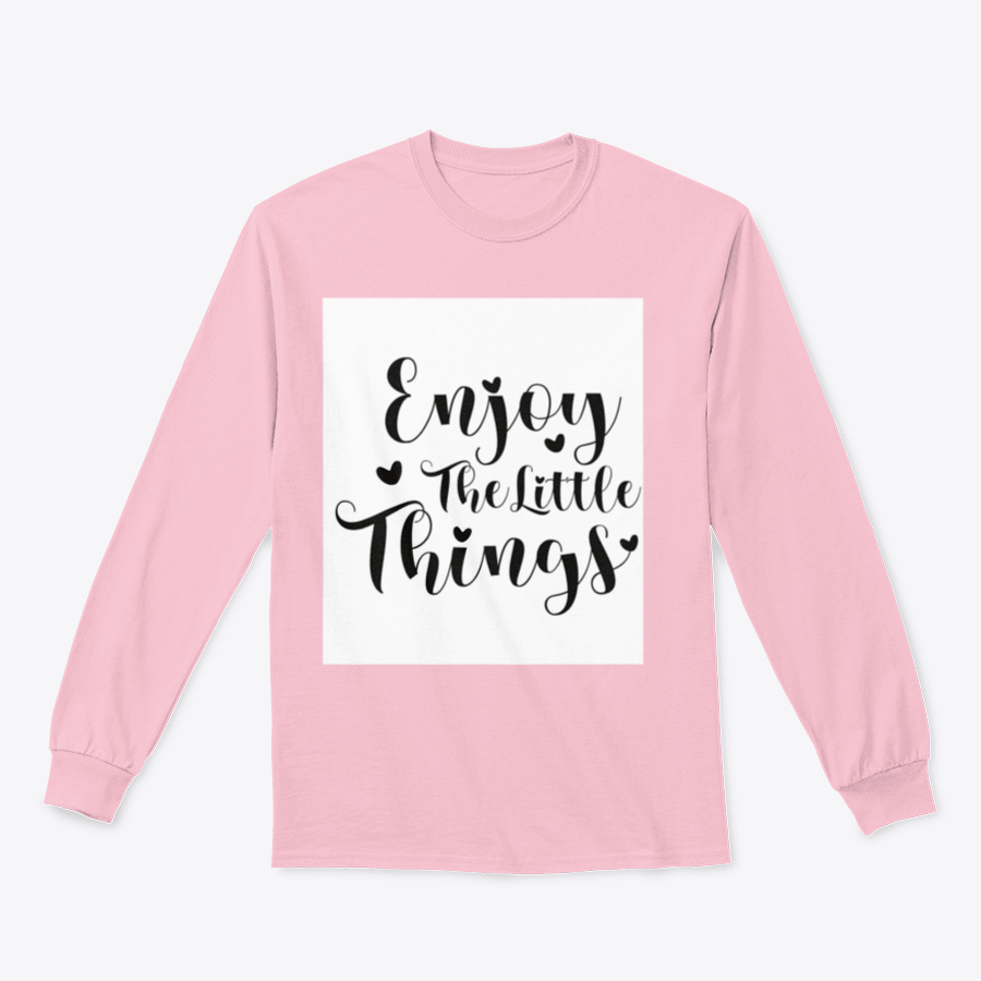 A cozy sweatshirt featuring the calligraphy design 'Enjoy The Little Things', showcasing its soft fabric and classic fit.