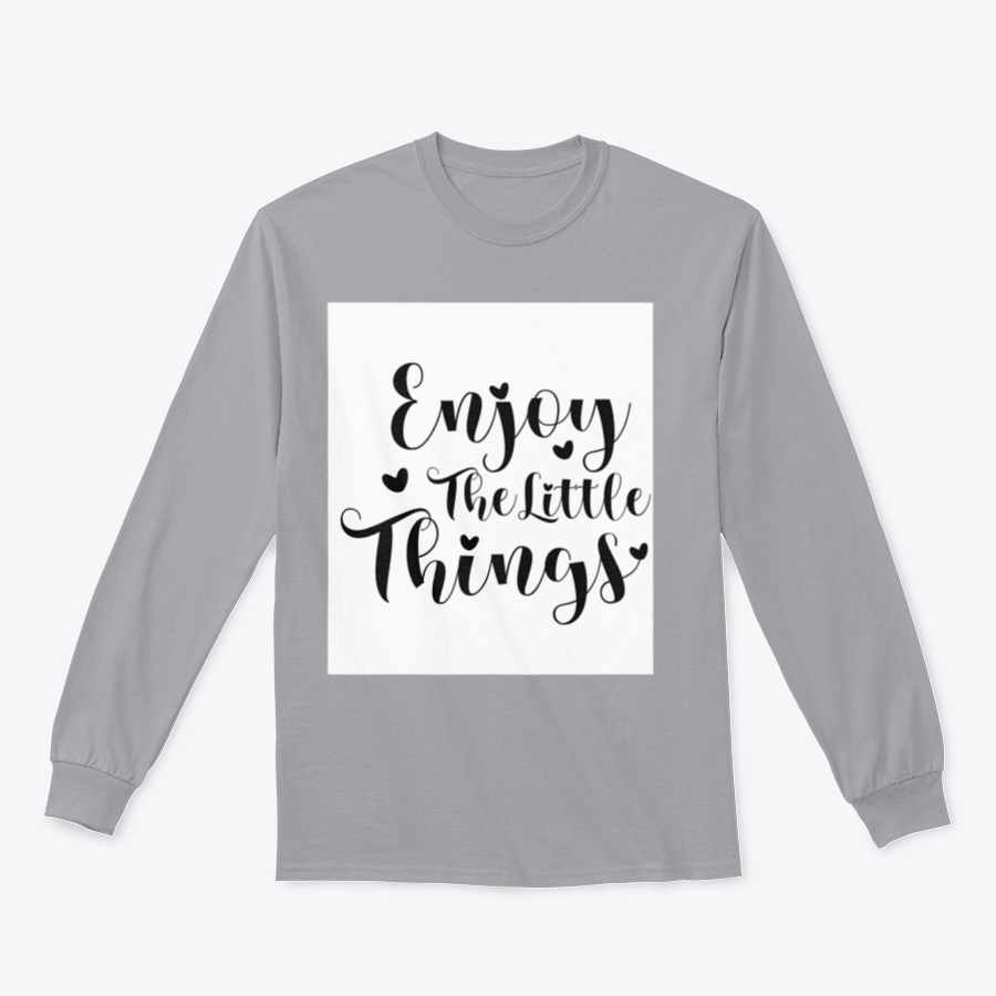 A cozy sweatshirt featuring the calligraphy design 'Enjoy The Little Things', showcasing its soft fabric and classic fit.