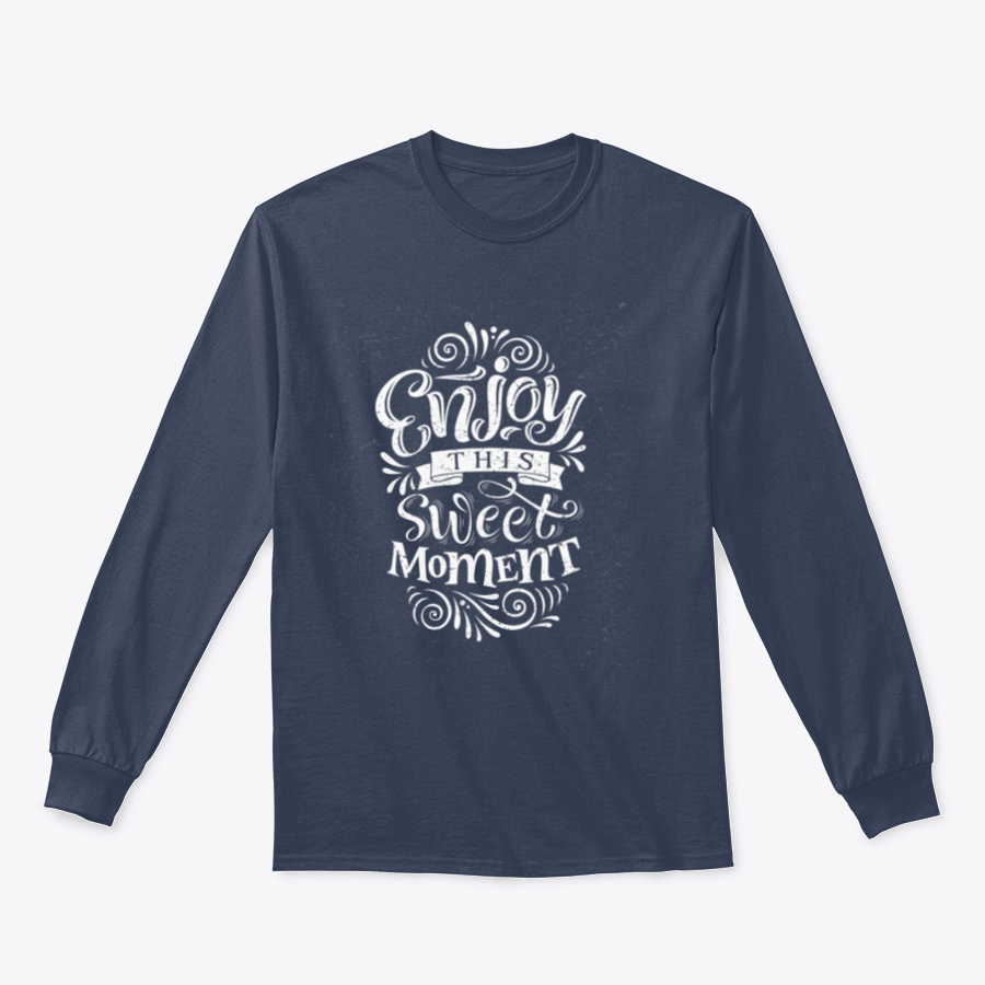 A cozy sweatshirt featuring the phrase 'Enjoy This Sweet Moment' in stylish typography, made from a soft cotton/polyester blend.