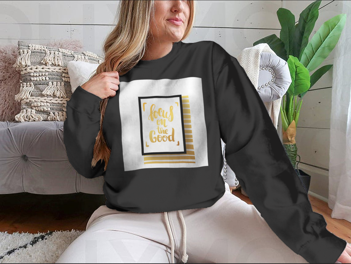 A cozy sweatshirt featuring the inspirational phrase 'Focus On The Good', made from a soft cotton-polyester blend.