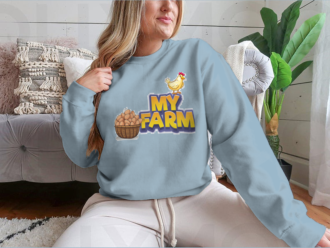 My Farm T-shirt featuring a whimsical chicken and eggs illustration, made from a soft cotton/polyester blend.