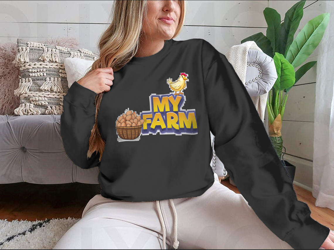 My Farm T-shirt featuring a whimsical chicken and eggs illustration, made from a soft cotton/polyester blend.