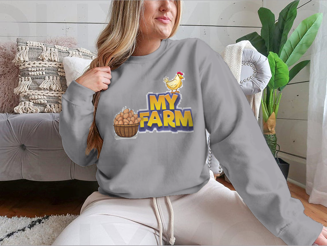 My Farm T-shirt featuring a whimsical chicken and eggs illustration, made from a soft cotton/polyester blend.