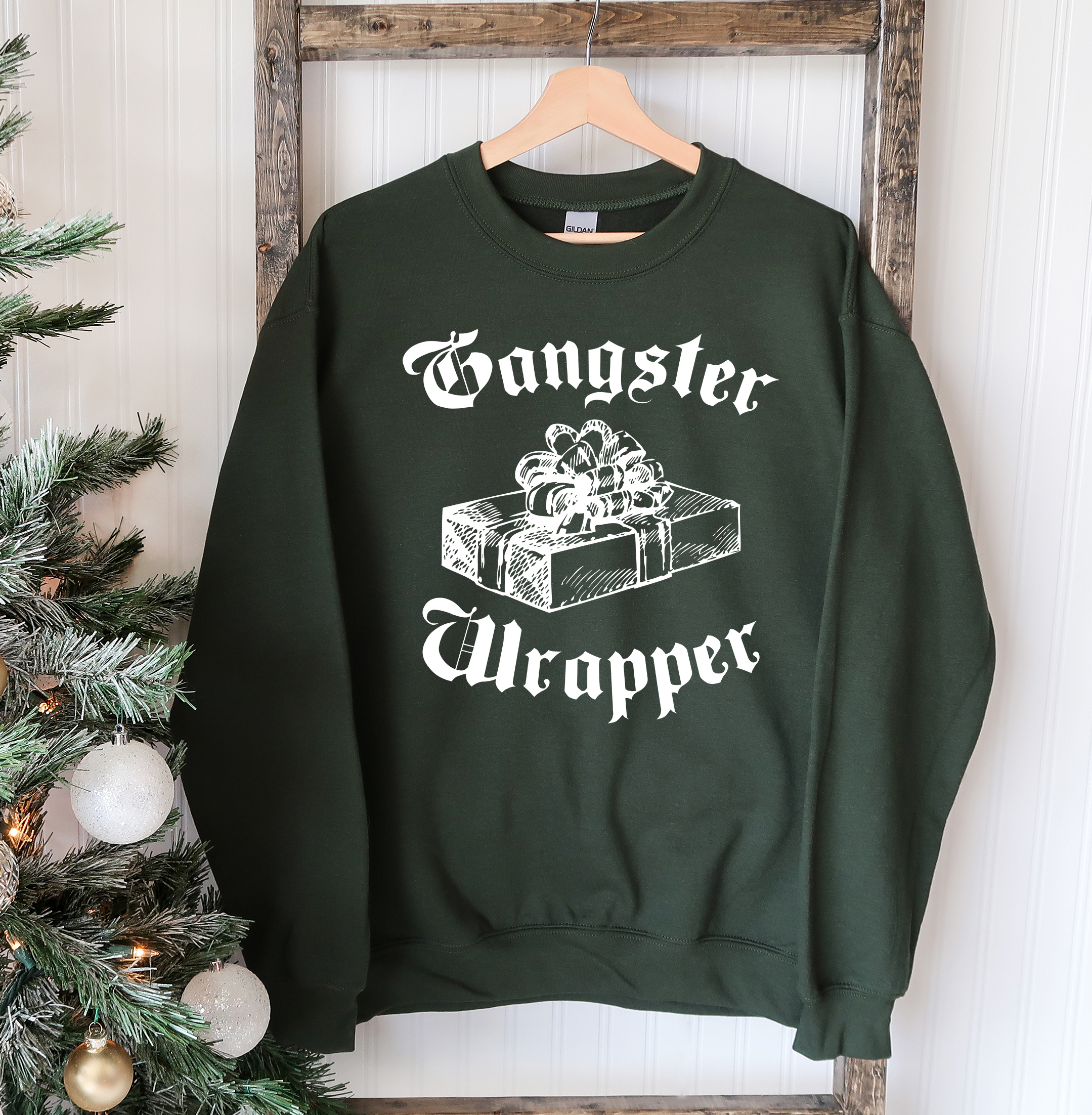 Gangsta Wrapper Christmas Sweatshirt featuring a crew neck design, soft fabric, and festive holiday theme, perfect for winter wear.