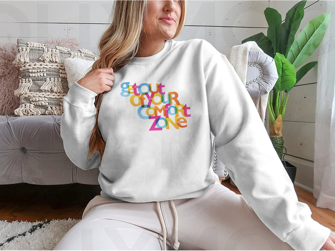 A stylish sweatshirt featuring the motivational phrase 'Get Out Of Your Comfort Zone', made from a soft cotton/polyester blend.