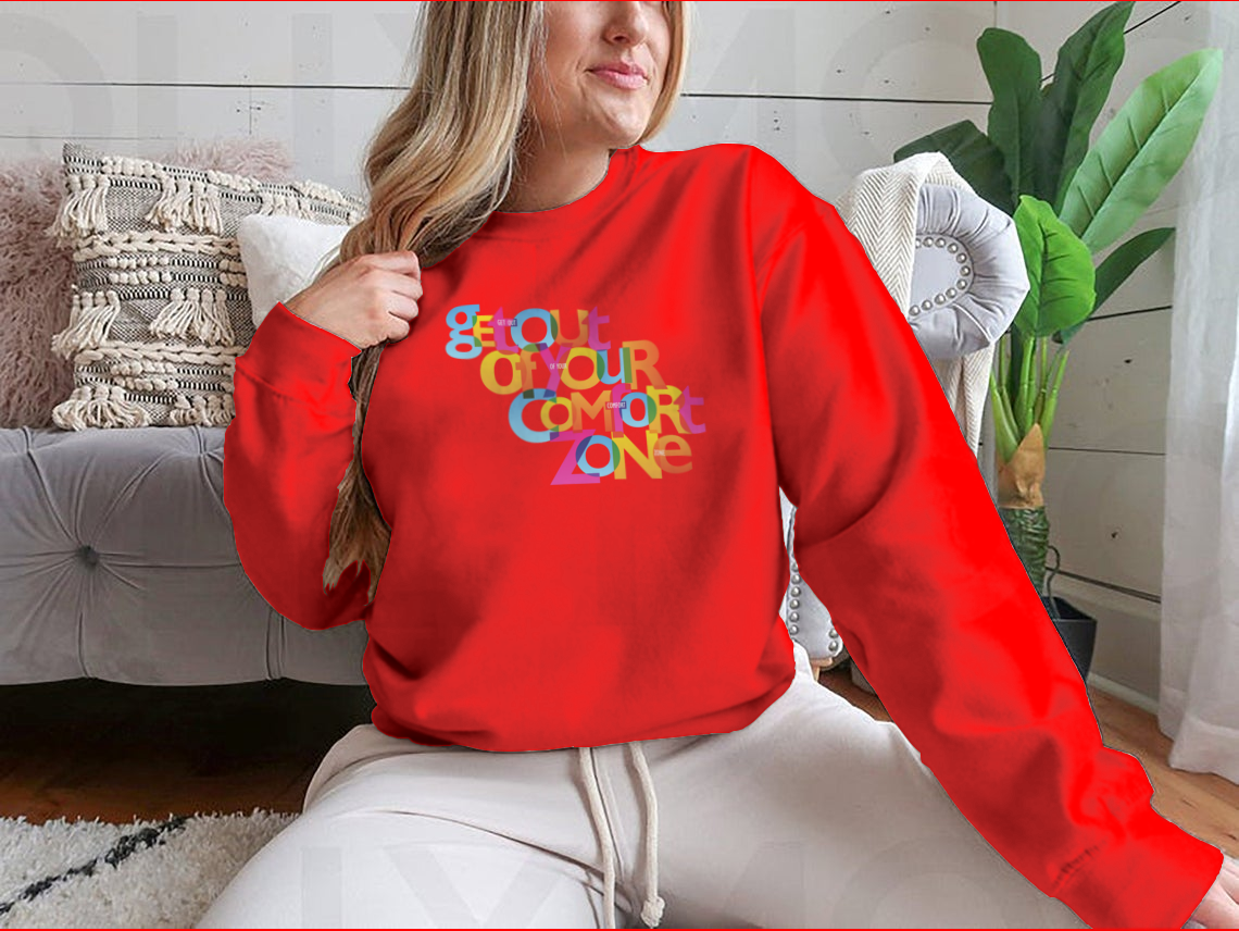 A stylish sweatshirt featuring the motivational phrase 'Get Out Of Your Comfort Zone', made from a soft cotton/polyester blend.