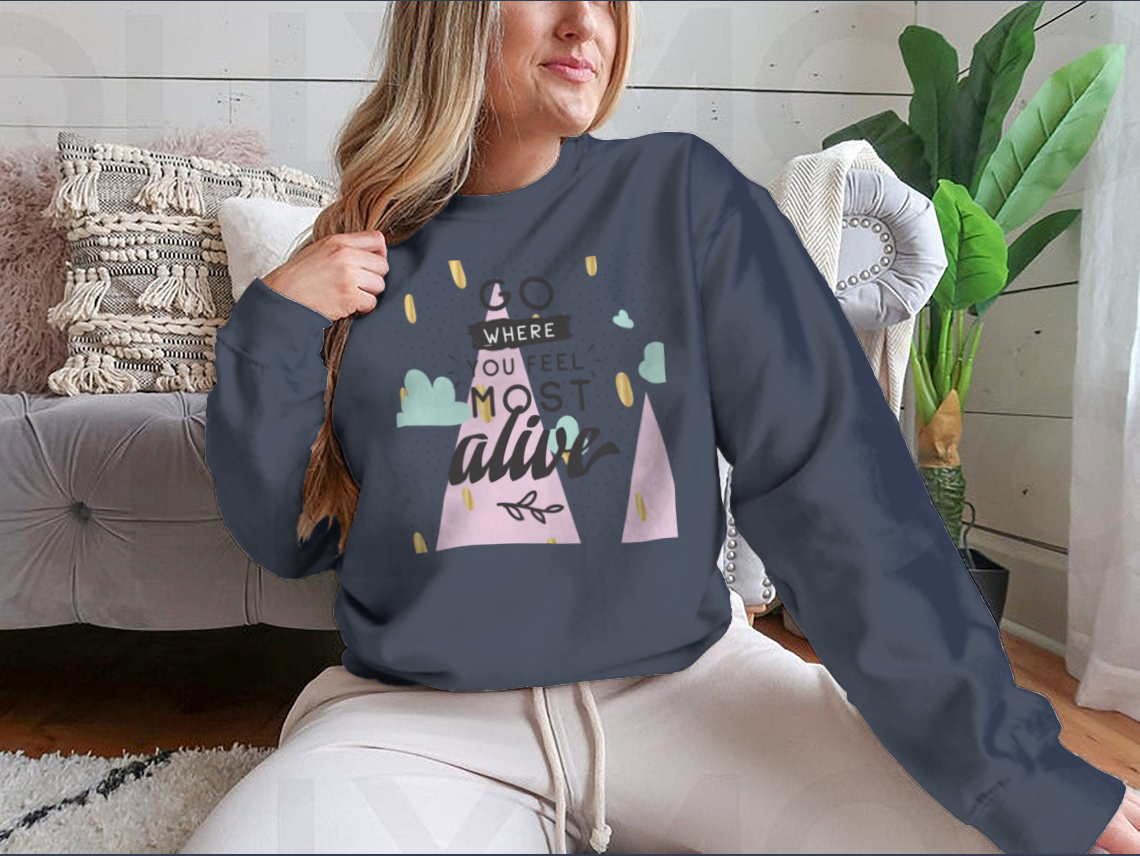 A cozy sweatshirt featuring the inspirational phrase 'Go Where You Feel Most Alive' in a stylish design, perfect for casual wear.