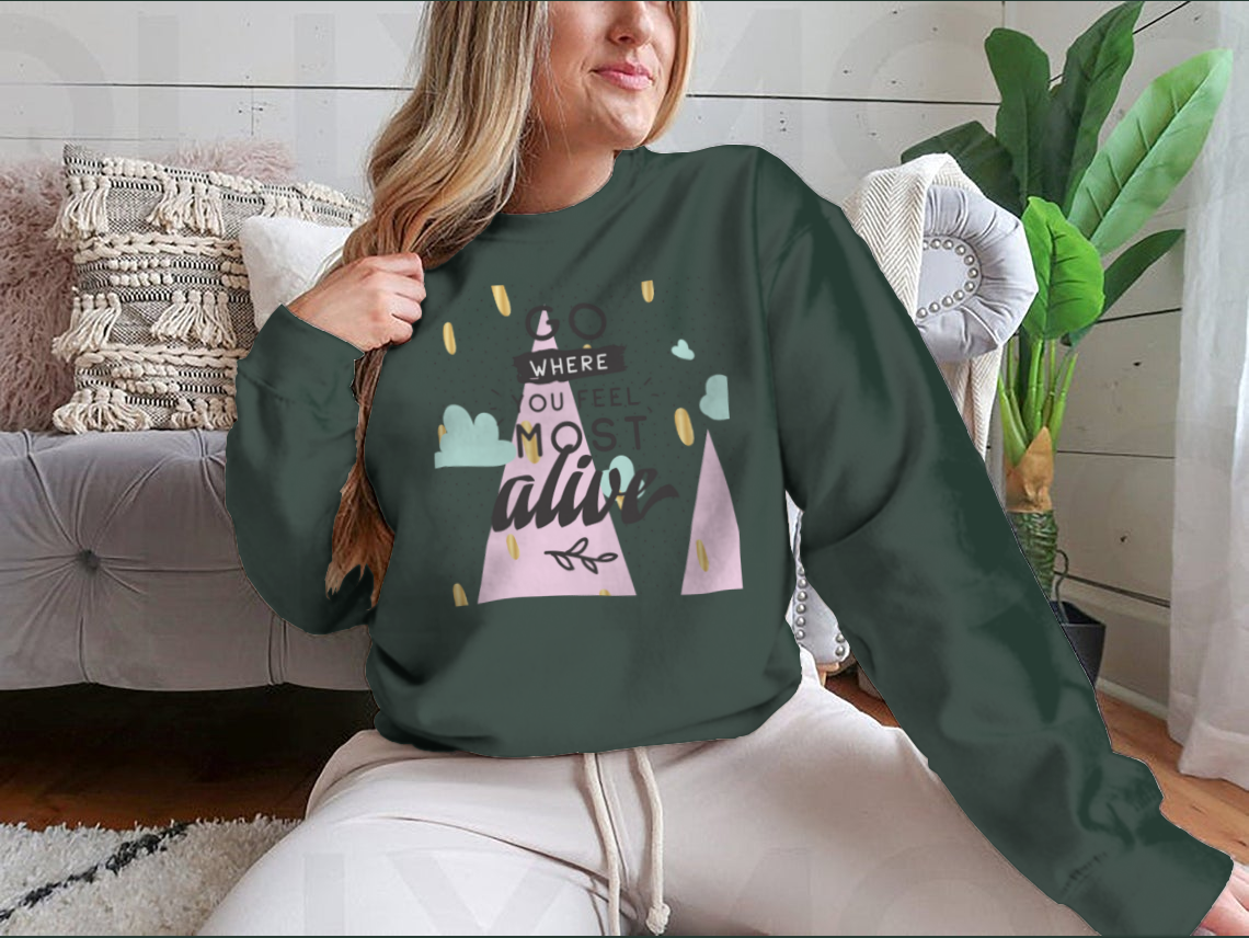 A cozy sweatshirt featuring the inspirational phrase 'Go Where You Feel Most Alive' in a stylish design, perfect for casual wear.