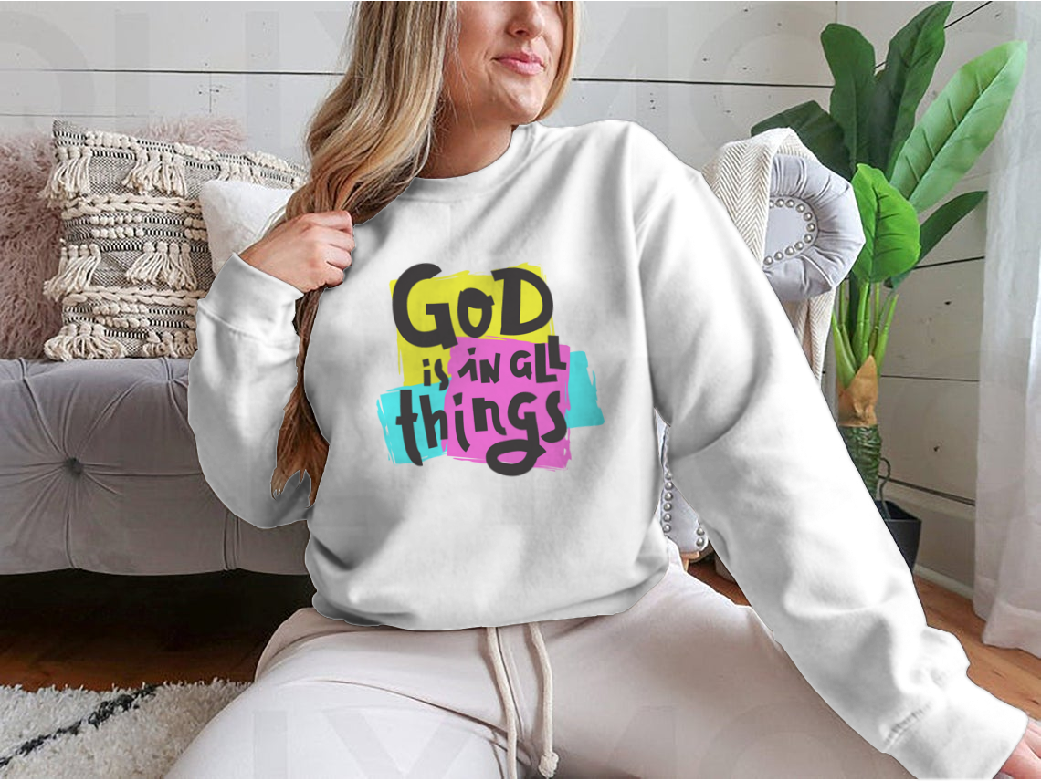 A cozy sweatshirt featuring the inspirational quote 'God Is In All Things' in a stylish design, perfect for everyday wear.