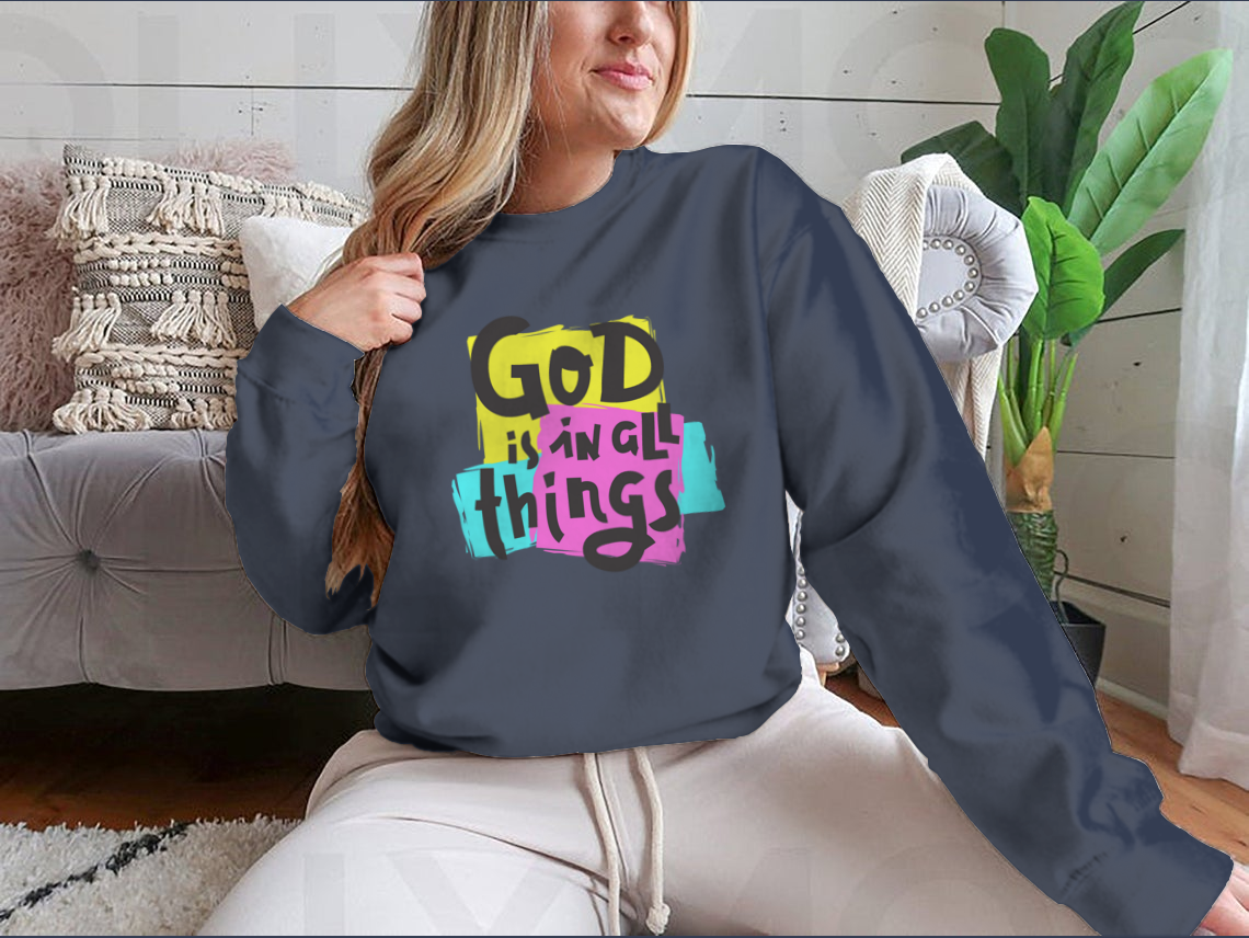 A cozy sweatshirt featuring the inspirational quote 'God Is In All Things' in a stylish design, perfect for everyday wear.