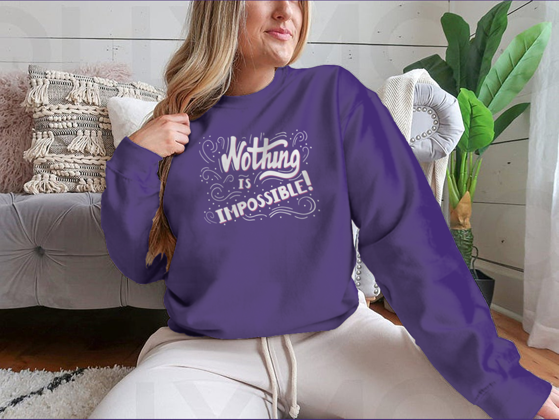 Hand drawn motivational quote lettering t-shirt with 'Nothing Is Impossible' design, showcasing a classic fit and soft fabric.