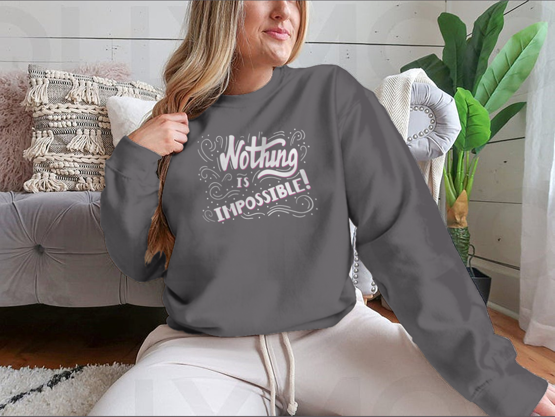 Hand drawn motivational quote lettering t-shirt with 'Nothing Is Impossible' design, showcasing a classic fit and soft fabric.