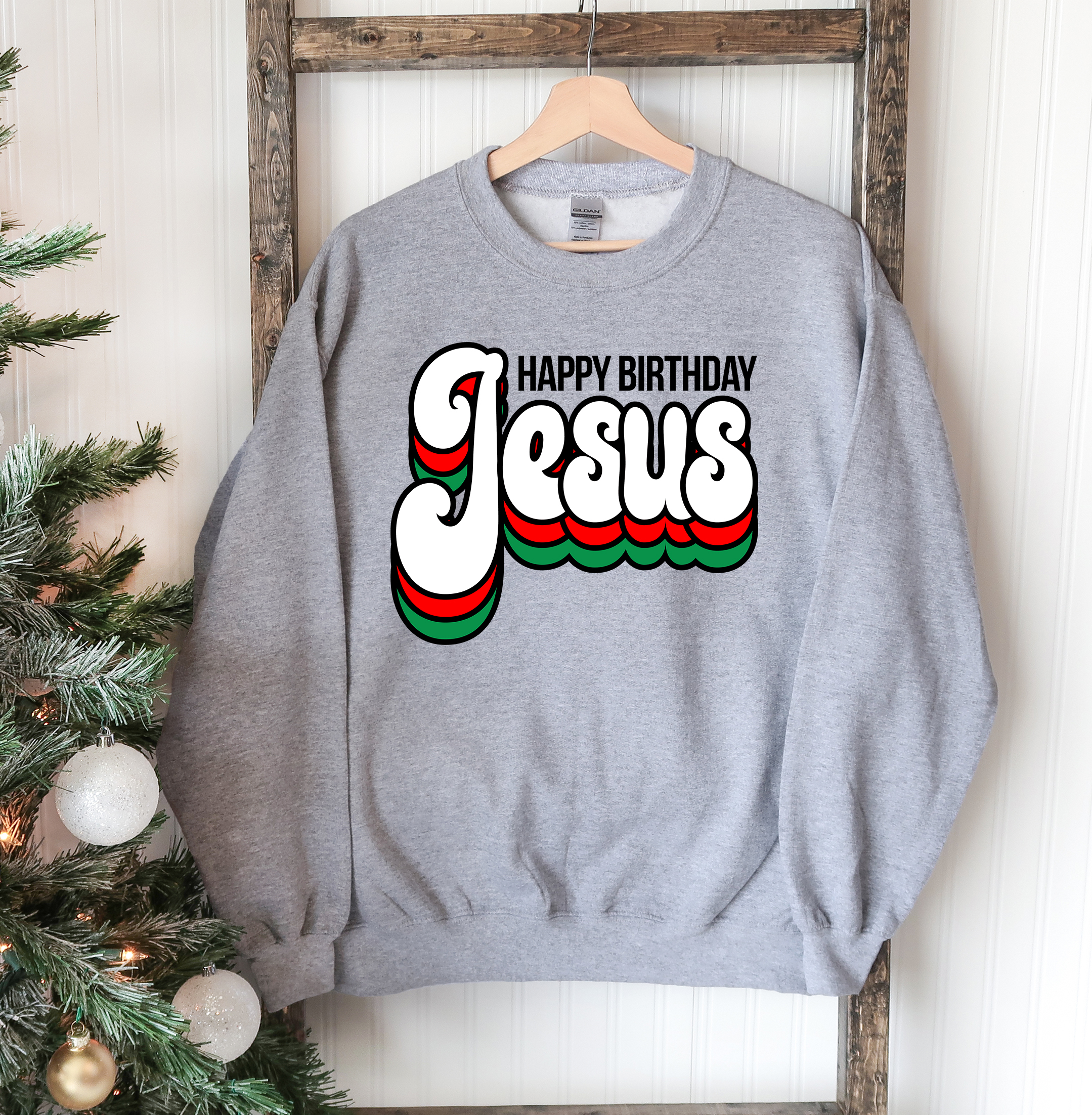 A cozy Happy Birthday Jesus Sweatshirt featuring a crew neck design, perfect for festive celebrations and everyday wear.