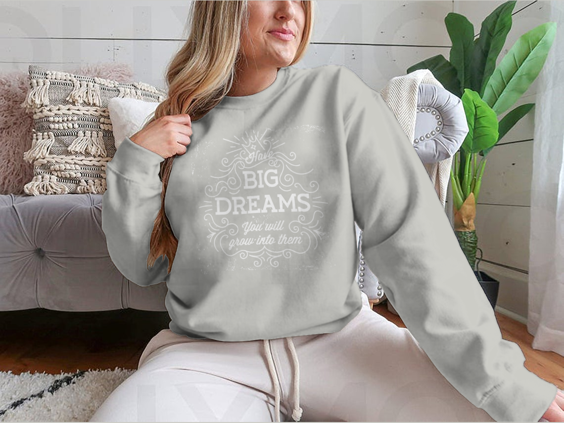 A stylish hand lettering quote design featuring 'Have Big Dreams You Will Grow Into Them' on a comfortable cotton/polyester blend fabric.