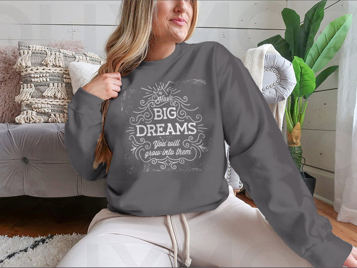 A stylish hand lettering quote design featuring 'Have Big Dreams You Will Grow Into Them' on a comfortable cotton/polyester blend fabric.