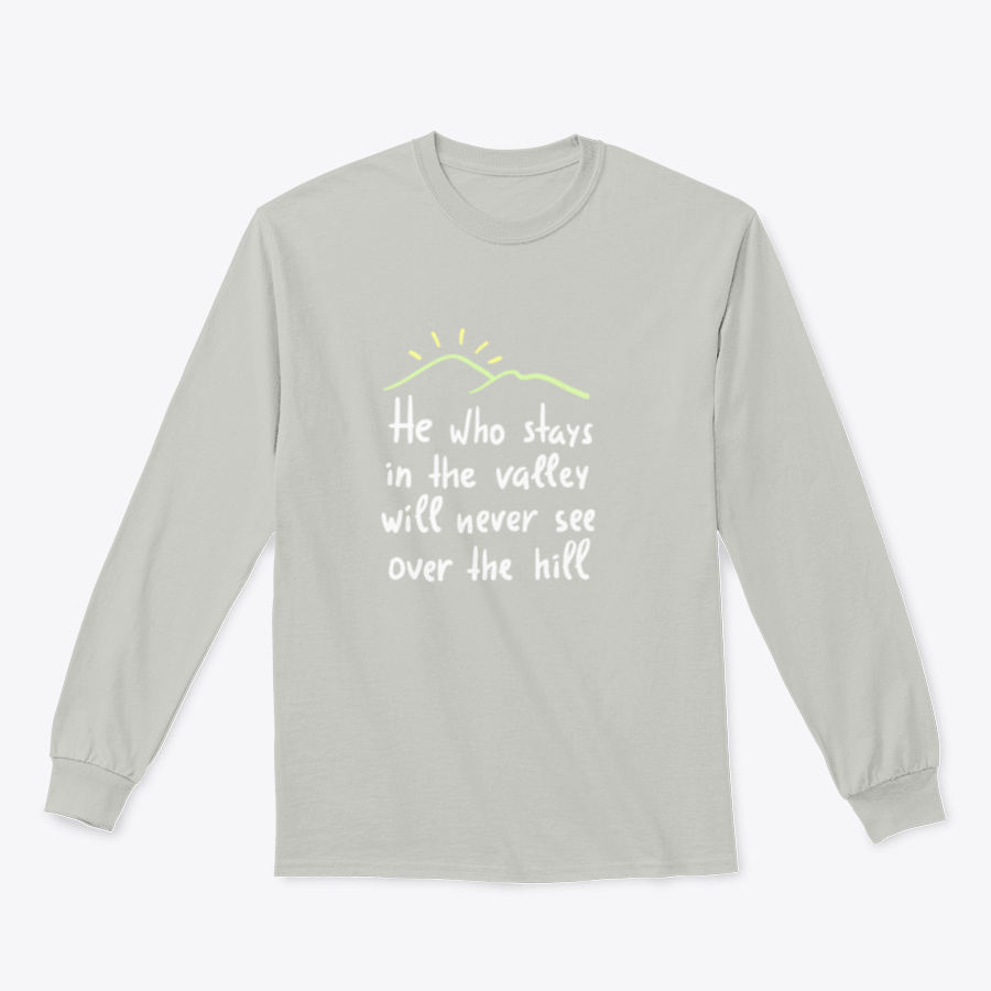 A motivational T-shirt featuring the quote 'He Who Stays In The Valley Will Never See Over The Hill' in stylish typography.