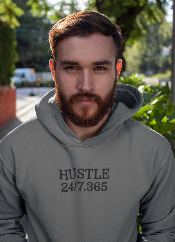 Hustle Harder Charcoal Hoodie featuring adjustable hood and banded cuffs, made from cotton/poly fleece blend.