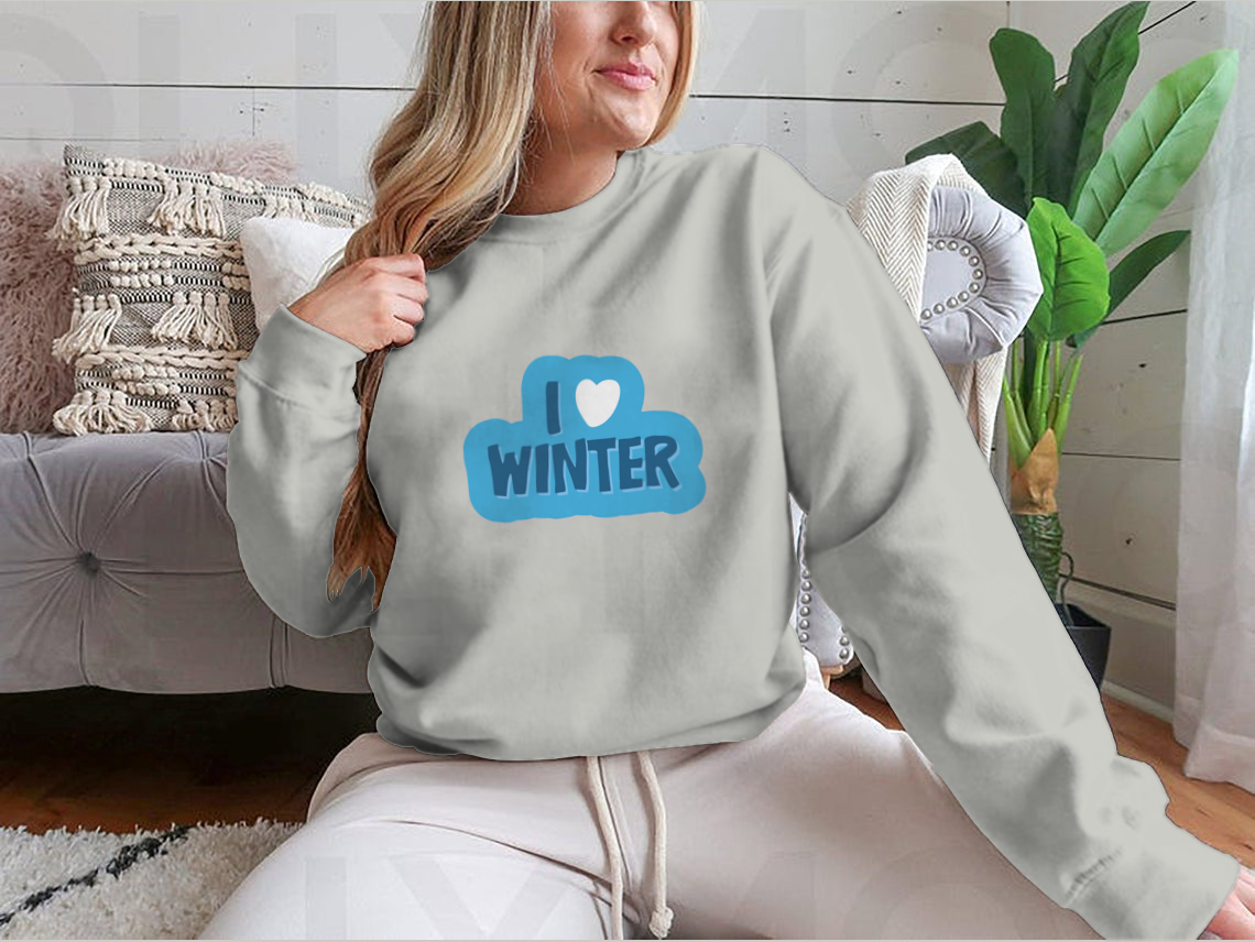 A cozy winter-themed shirt featuring the motivational phrase 'I Love Winter Christmas And New Year' with a heart design, perfect for festive celebrations.