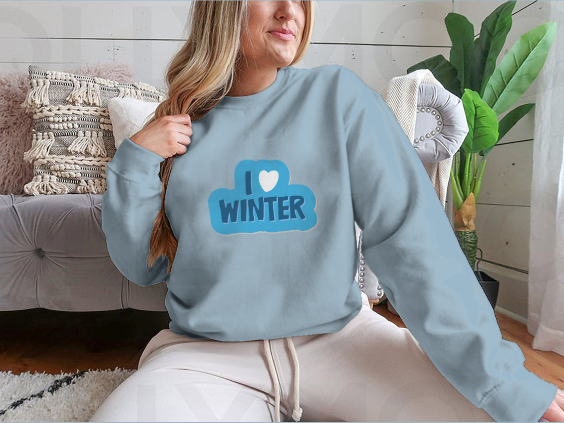 A cozy winter-themed shirt featuring the motivational phrase 'I Love Winter Christmas And New Year' with a heart design, perfect for festive celebrations.