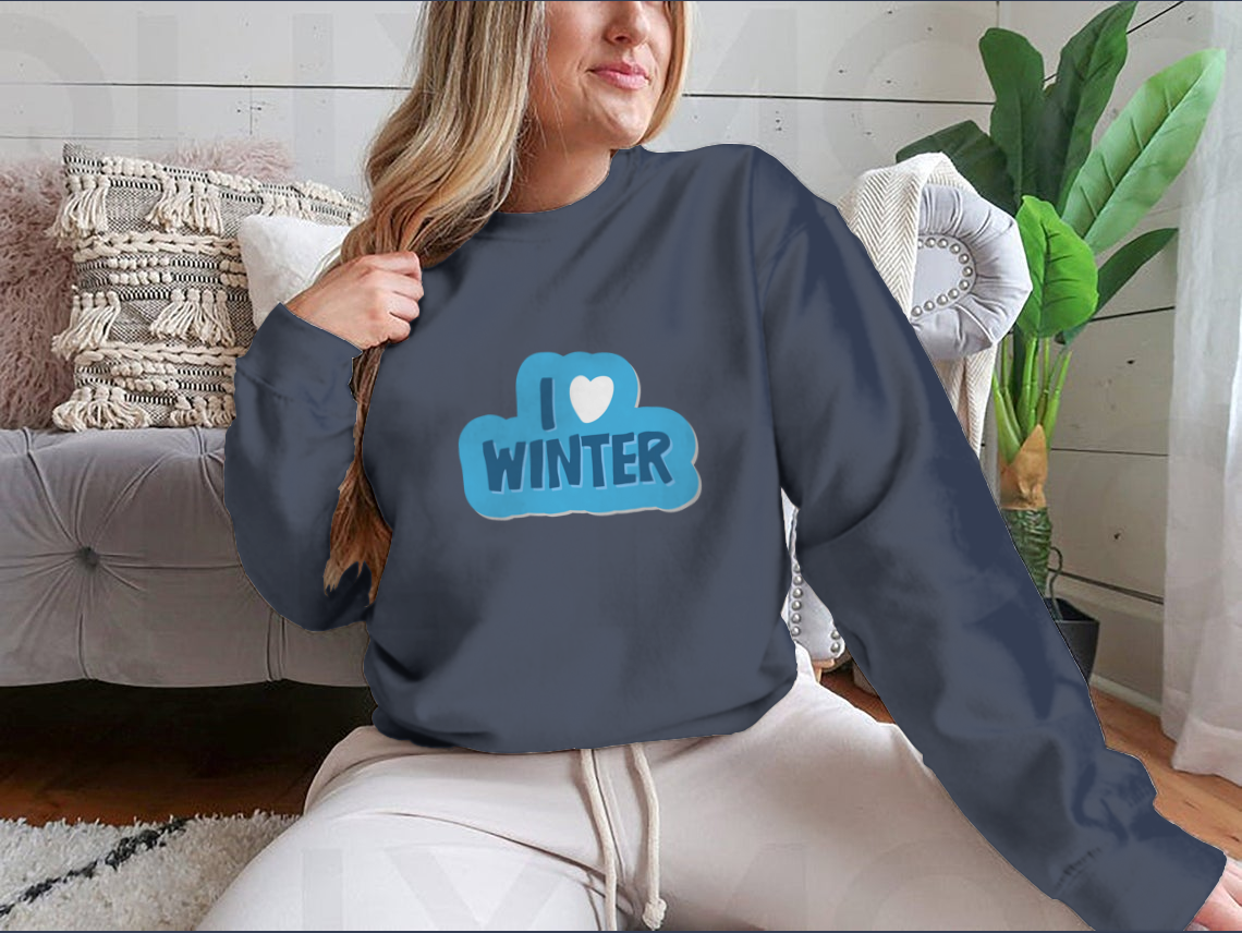 A cozy winter-themed shirt featuring the motivational phrase 'I Love Winter Christmas And New Year' with a heart design, perfect for festive celebrations.