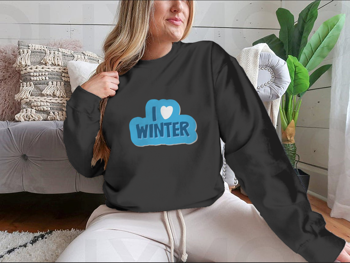 A cozy winter-themed shirt featuring the motivational phrase 'I Love Winter Christmas And New Year' with a heart design, perfect for festive celebrations.