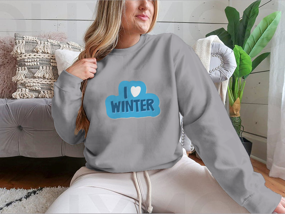 A cozy winter-themed shirt featuring the motivational phrase 'I Love Winter Christmas And New Year' with a heart design, perfect for festive celebrations.