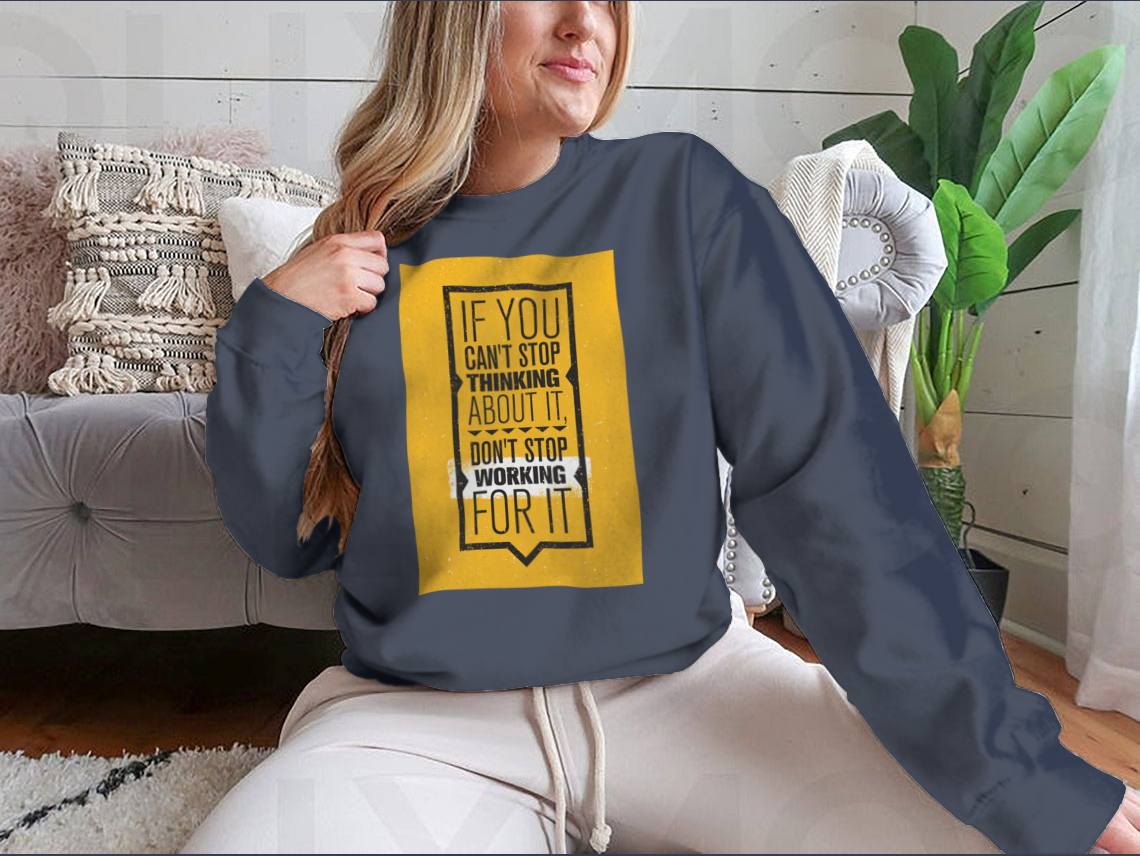 Motivational design featuring the phrase 'If You Can't Stop Thinking About It, Don't Stop Working For It' on a comfortable cotton-polyester blend shirt.