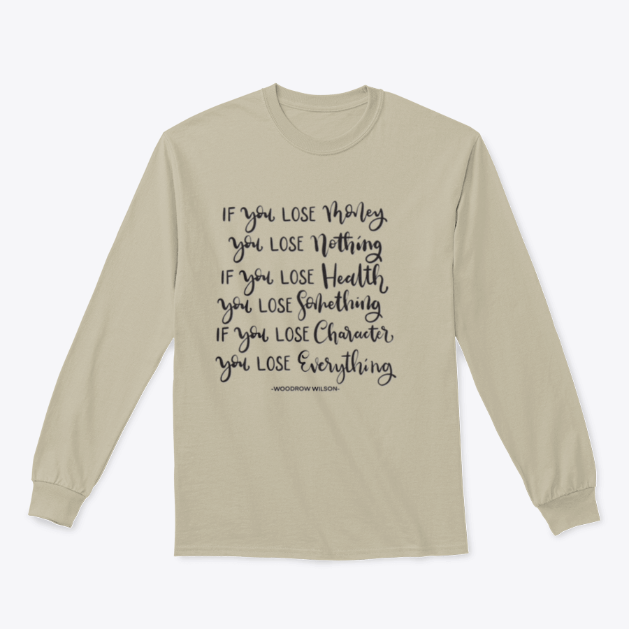 A stylish t-shirt featuring the hand lettering of the quote 'If You Lose Character You Lose Everything' on a soft cotton fabric.