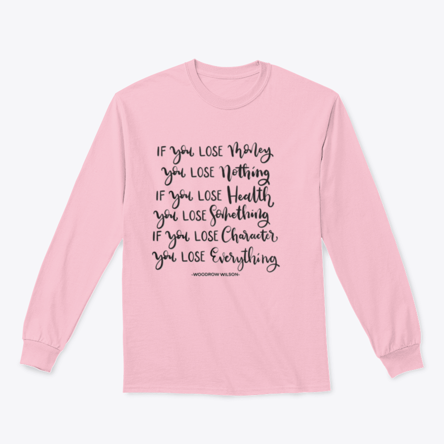 A stylish t-shirt featuring the hand lettering of the quote 'If You Lose Character You Lose Everything' on a soft cotton fabric.