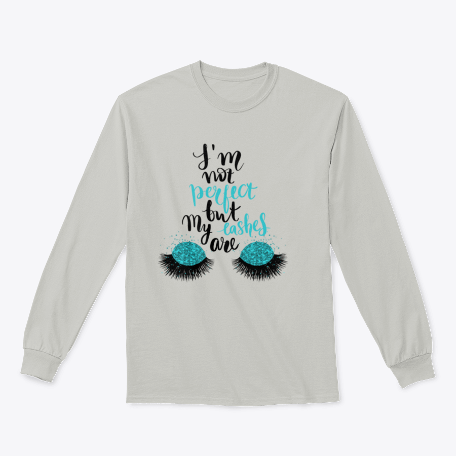 A stylish t-shirt featuring the phrase 'I'm Not Perfect, But My Lashes Are' in a motivational design, showcasing a classic fit and soft fabric.