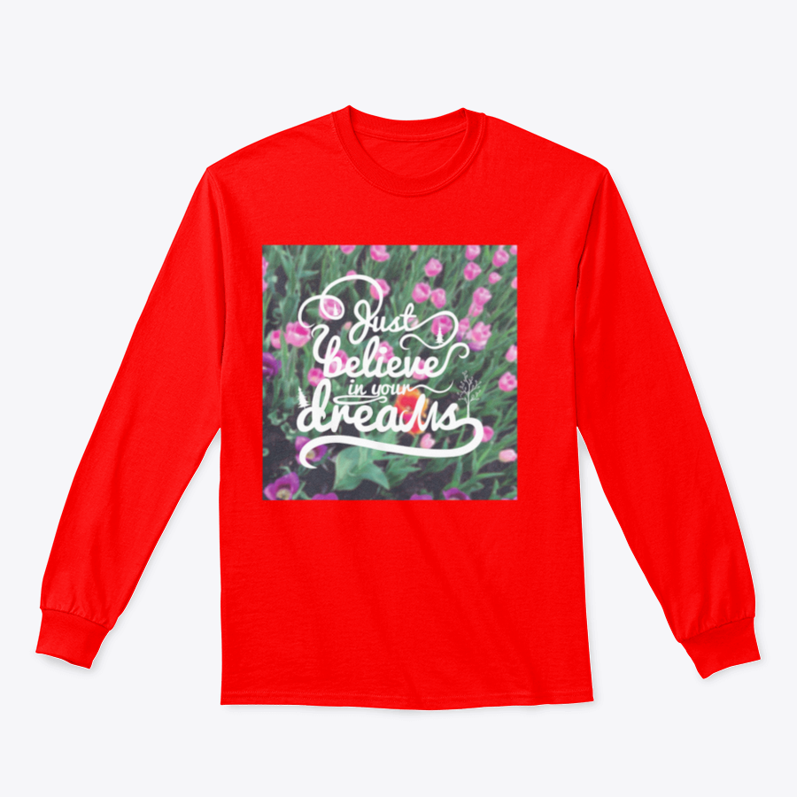 A stylish apparel featuring a blurred background with vibrant tulips and the motivational phrase 'Just Believe In Your Dreams'.