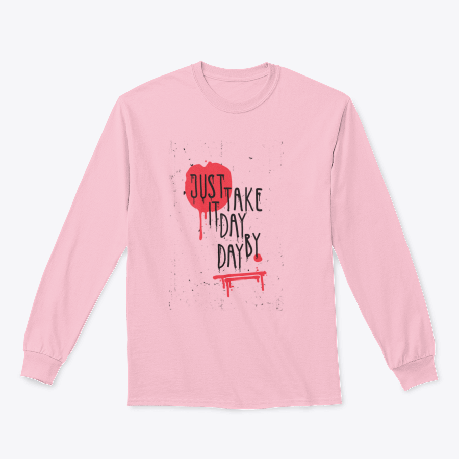 A cozy sweatshirt featuring the motivational phrase 'Just Take It Day By Day' in stylish typography, perfect for casual wear.