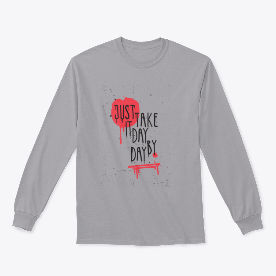 A cozy sweatshirt featuring the motivational phrase 'Just Take It Day By Day' in stylish typography, perfect for casual wear.