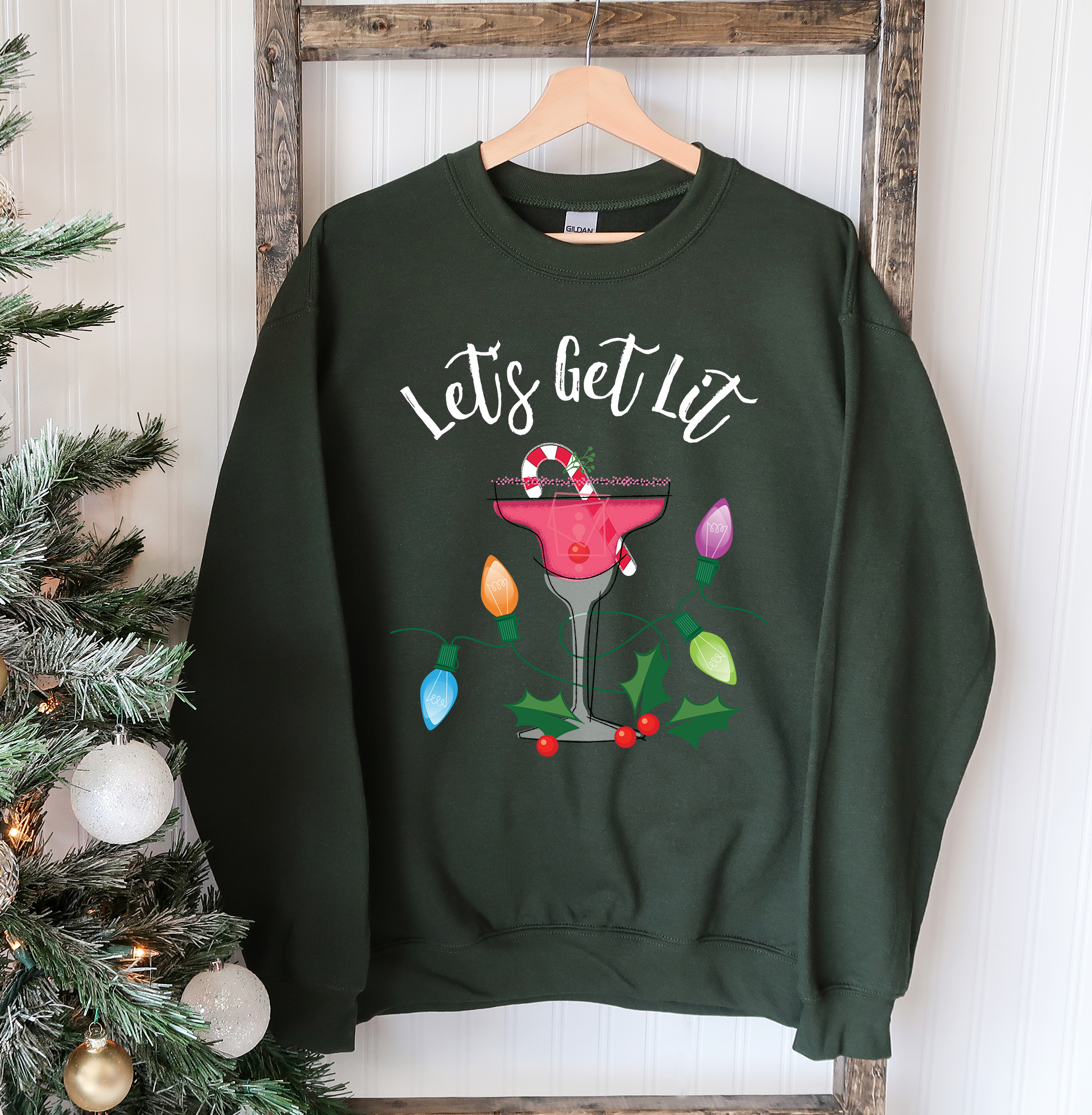 A cozy unisex sweatshirt featuring a festive 'Let's Get Lit' design, perfect for Christmas celebrations.