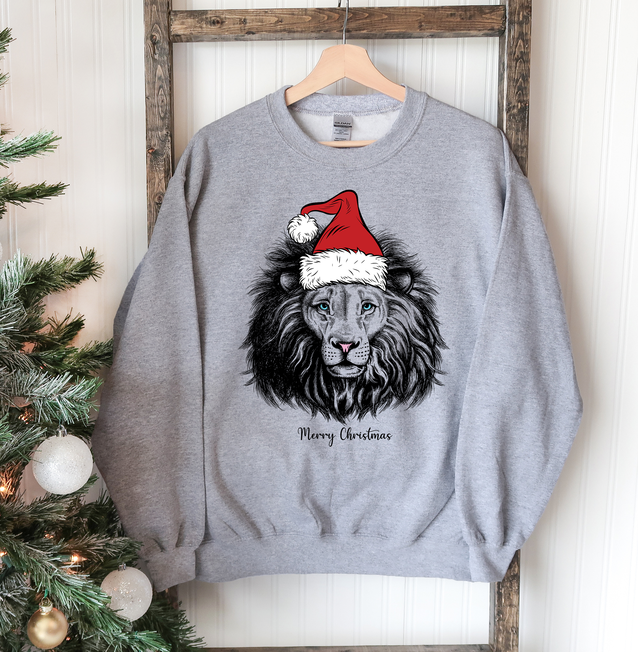 A cozy Lion Christmas Sweatshirt featuring a classic crew neck design, perfect for festive occasions.