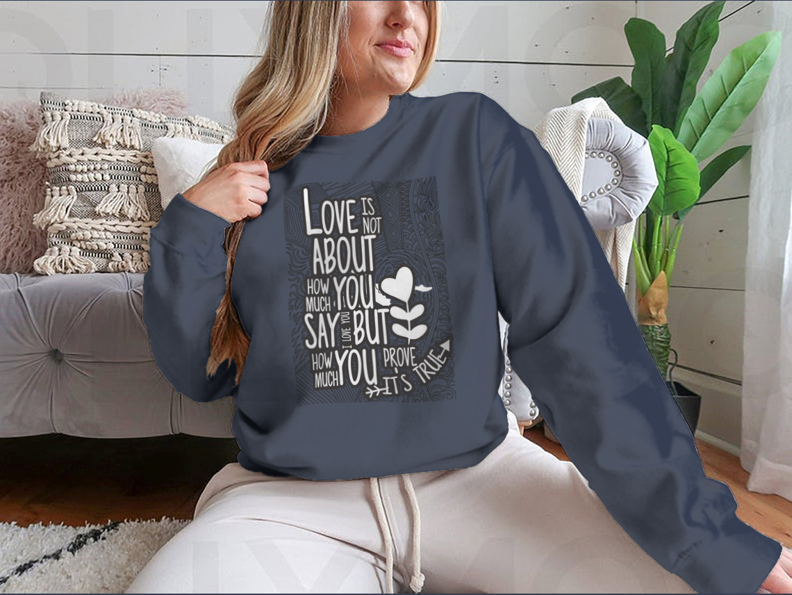 A stylish t-shirt featuring the quote about love, made from a comfortable cotton-polyester blend.