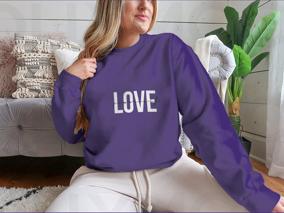 A cozy Love Yourself sweatshirt featuring a classic fit and soft fabric blend, perfect for casual wear and promoting self-love.