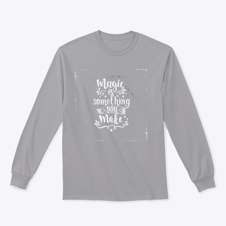 A cozy sweatshirt featuring the phrase 'Magic Is Something You Make', showcasing a classic fit and soft fabric blend.