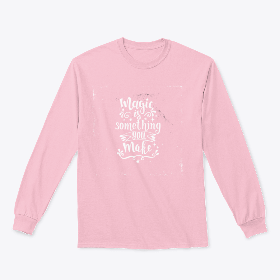 A cozy sweatshirt featuring the phrase 'Magic Is Something You Make', showcasing a classic fit and soft fabric blend.