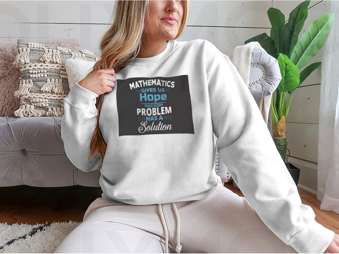 A humorous t-shirt featuring the quote 'Mathematics Gives Us Hope That Every Problem Has A Solution', made from soft cotton fabric.