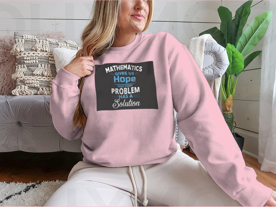 A humorous t-shirt featuring the quote 'Mathematics Gives Us Hope That Every Problem Has A Solution', made from soft cotton fabric.