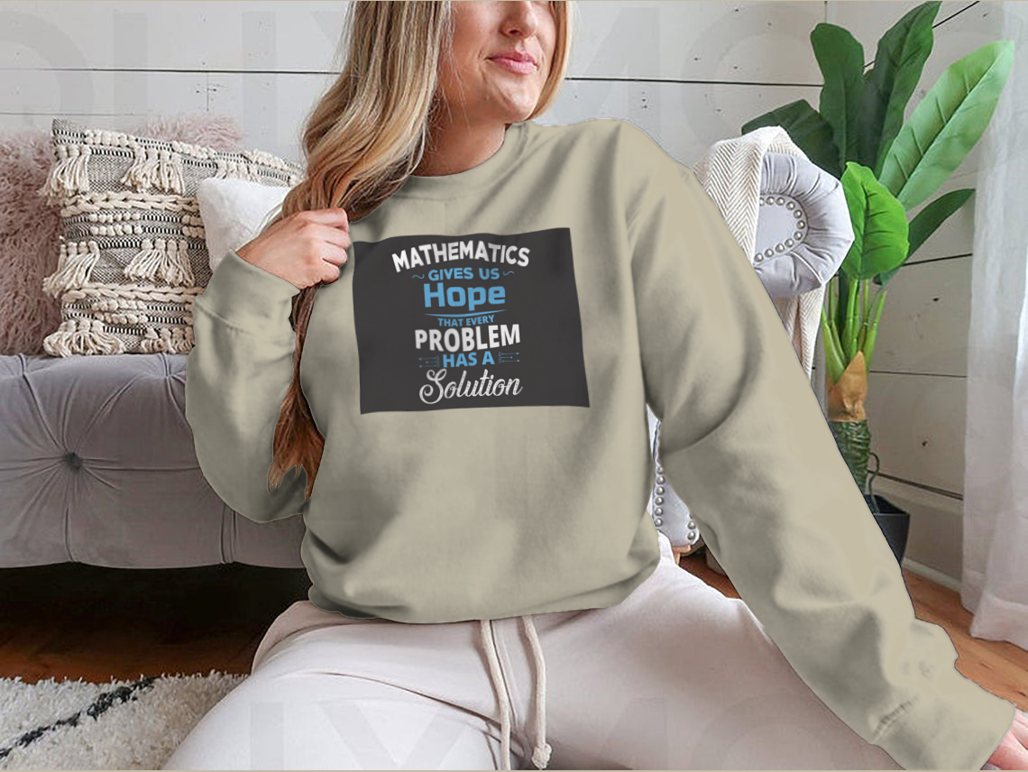 A humorous t-shirt featuring the quote 'Mathematics Gives Us Hope That Every Problem Has A Solution', made from soft cotton fabric.