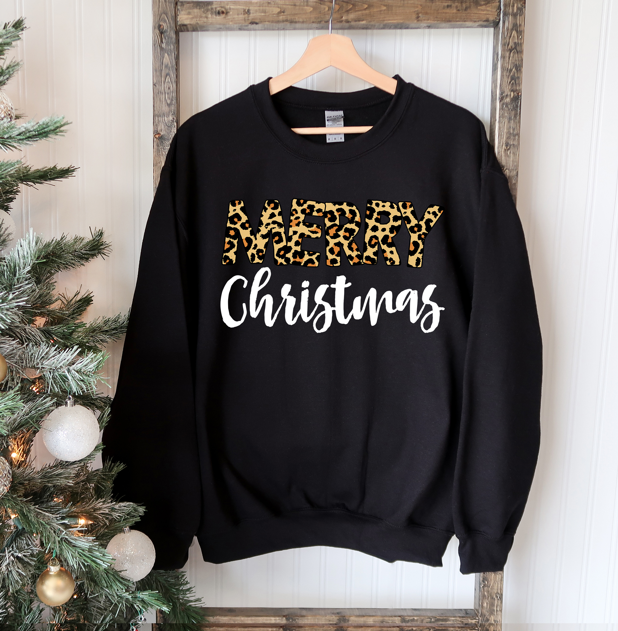 A cozy Merry Christmas Sweatshirt featuring a classic crew neck design, made from soft cotton-polyester blend fabric, perfect for festive occasions.