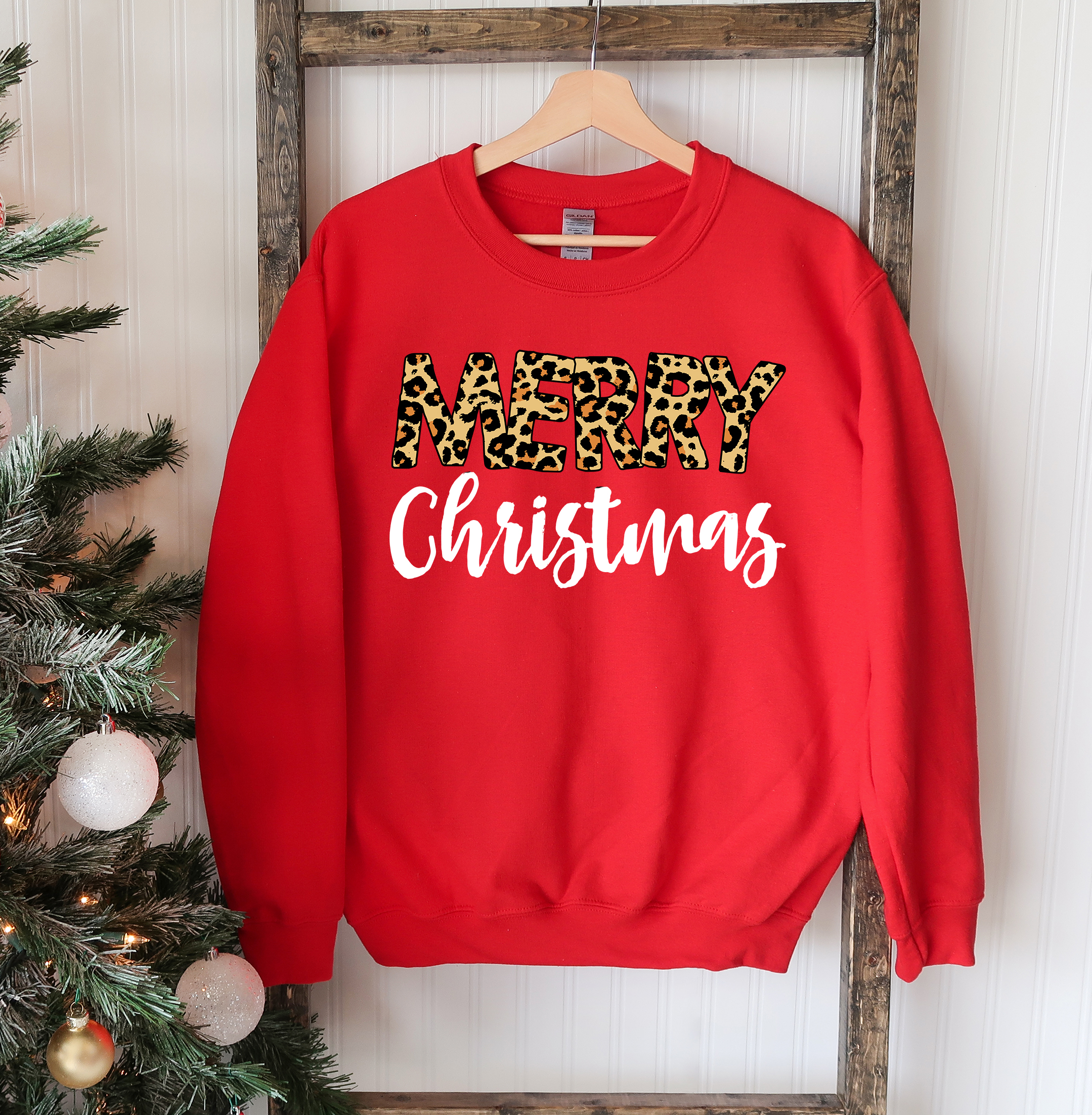 A cozy Merry Christmas Sweatshirt featuring a classic crew neck design, made from soft cotton-polyester blend fabric, perfect for festive occasions.