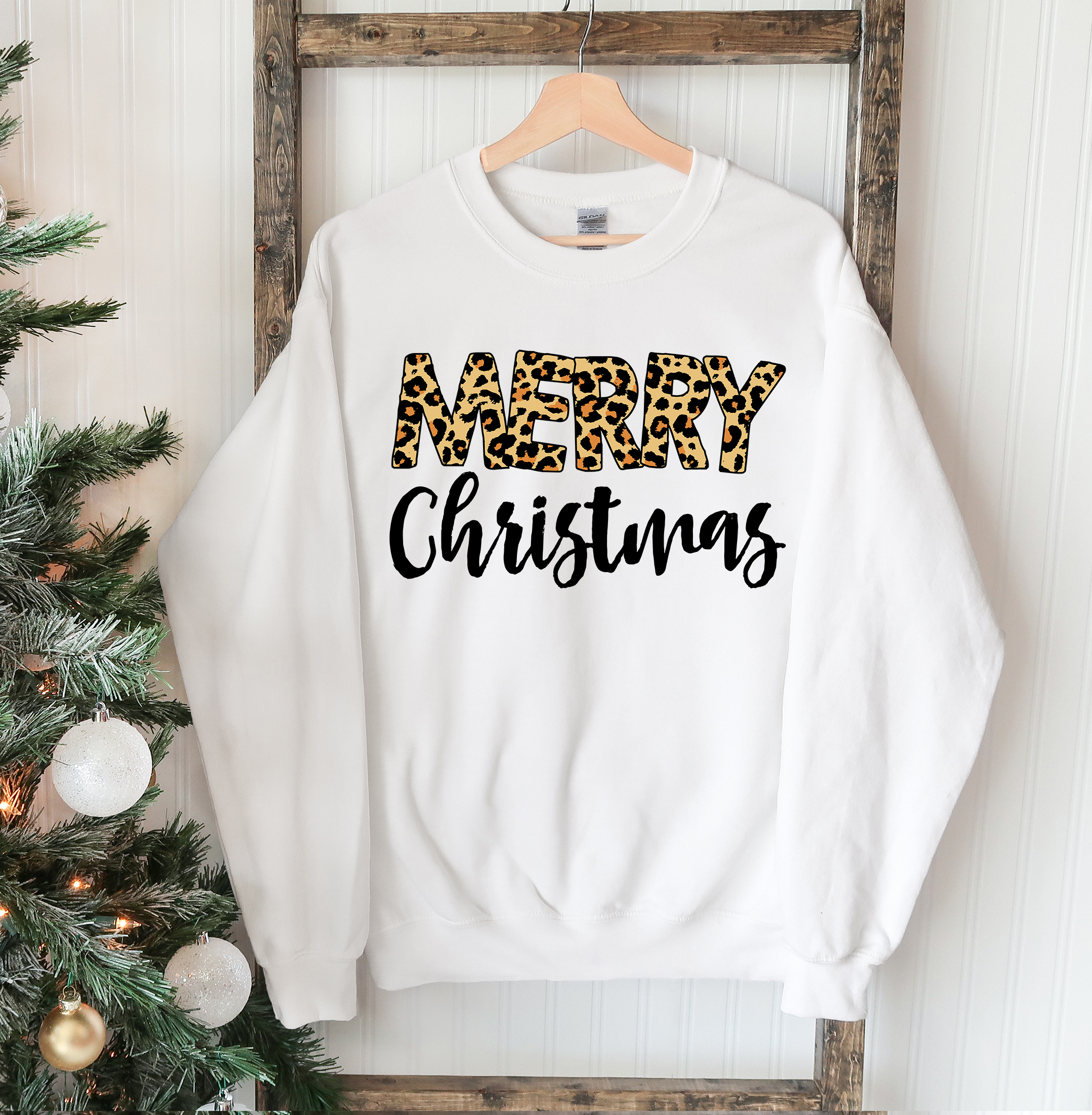 A cozy Merry Christmas Sweatshirt featuring a classic crew neck design, made from soft cotton-polyester blend fabric, perfect for festive occasions.