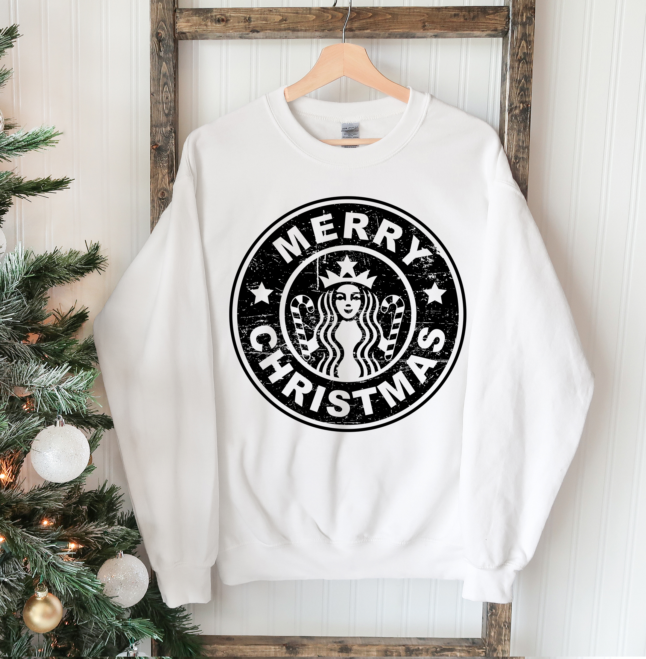 A cozy Merry Christmas Sweatshirt featuring a festive design, perfect for holiday celebrations.