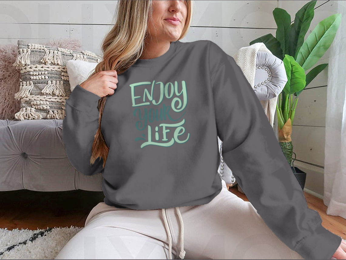 A stylish 'Enjoy Your Life' shirt design featuring motivational quote, made from soft cotton fabric, perfect for casual wear.